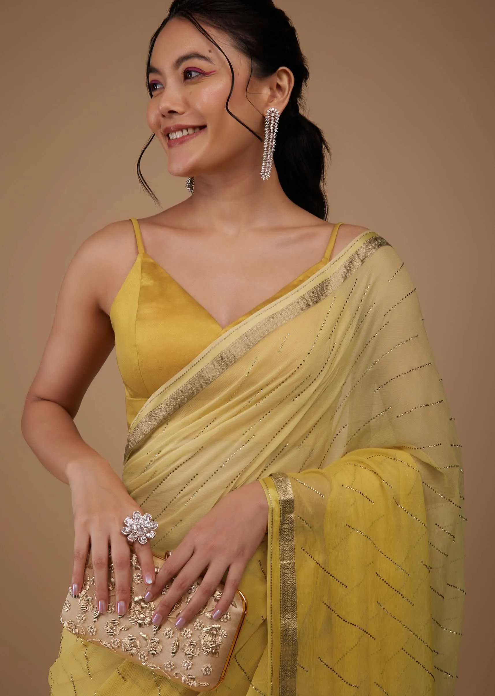 Daffodil Yellow Chiffon Saree With Swarovski Stone Embellishments And Zari Border