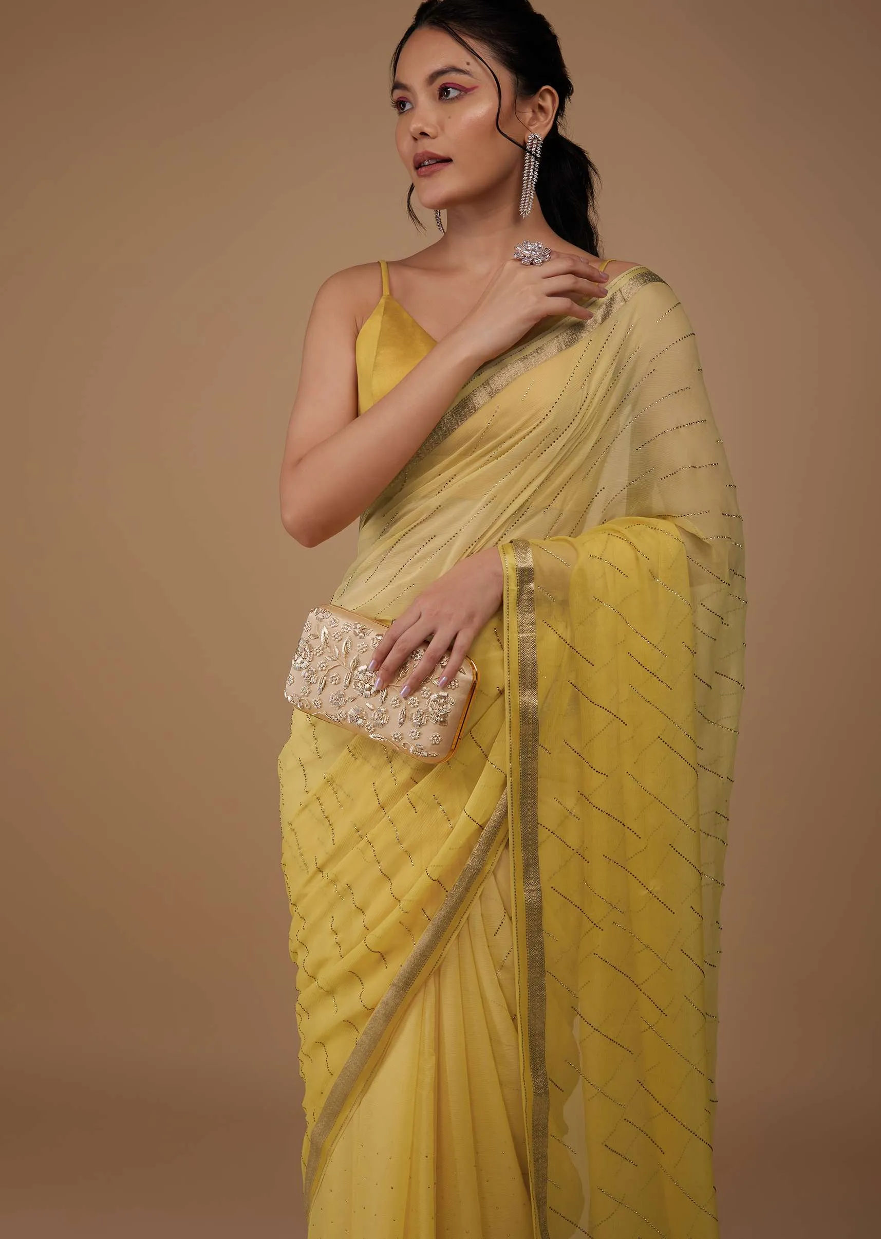 Daffodil Yellow Chiffon Saree With Swarovski Stone Embellishments And Zari Border