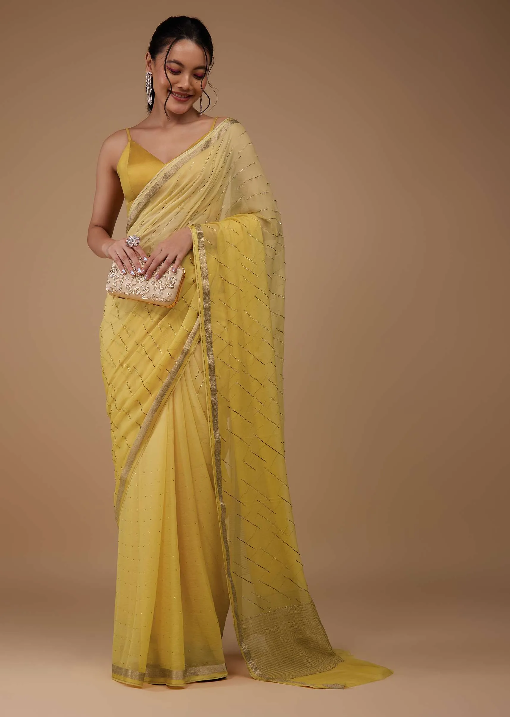 Daffodil Yellow Chiffon Saree With Swarovski Stone Embellishments And Zari Border