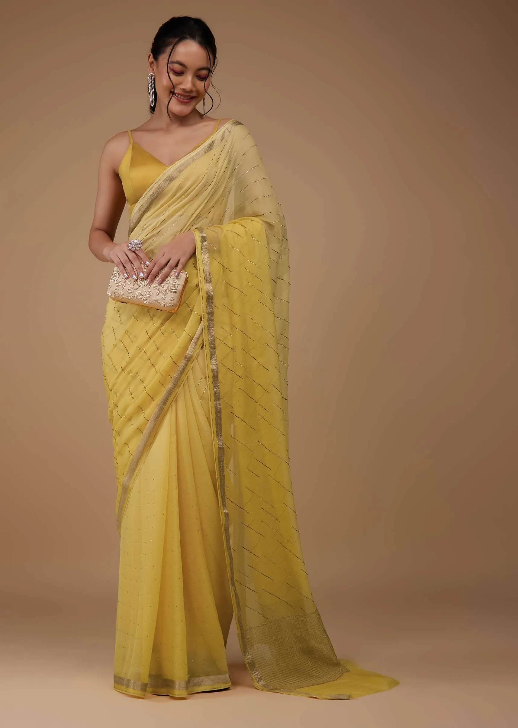 Daffodil Yellow Chiffon Saree With Swarovski Stone Embellishments And Zari Border