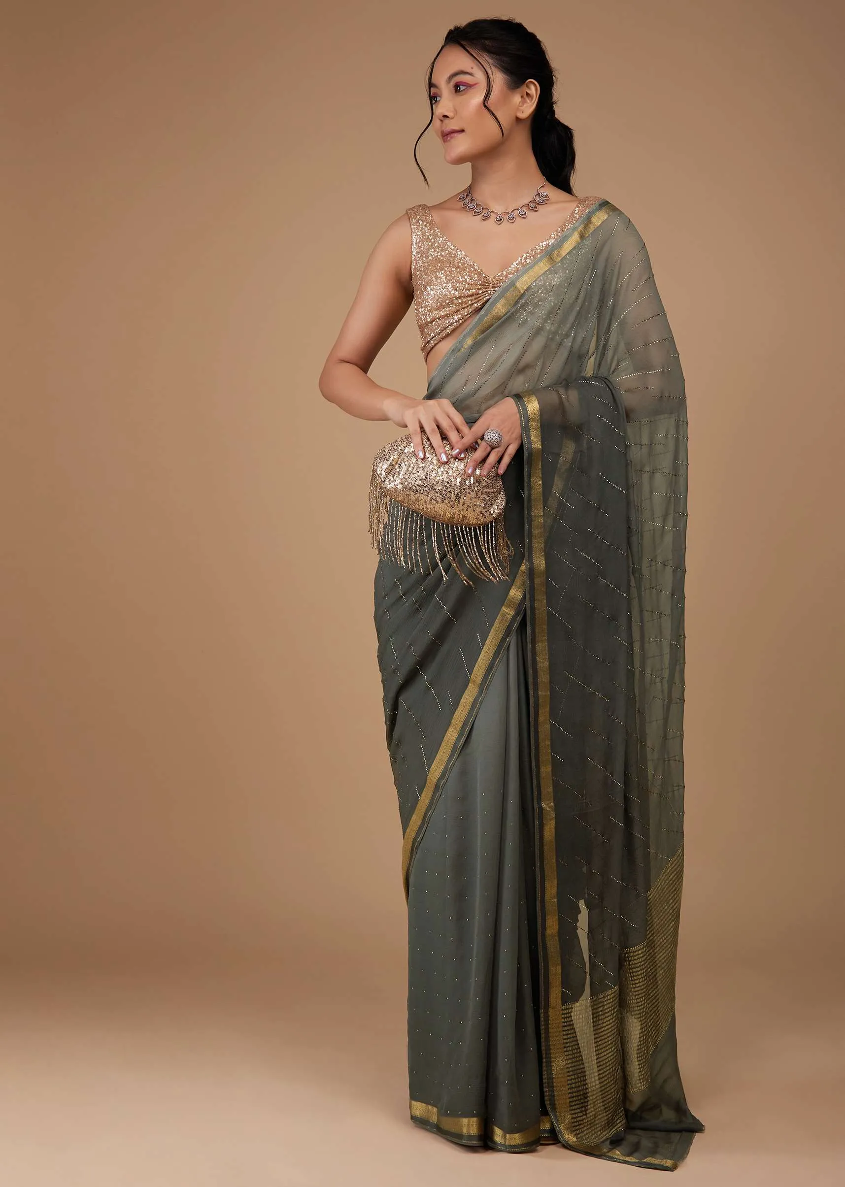 Fog Grey Chiffon Saree With Swarovski Stone Embellishments And Zari Border