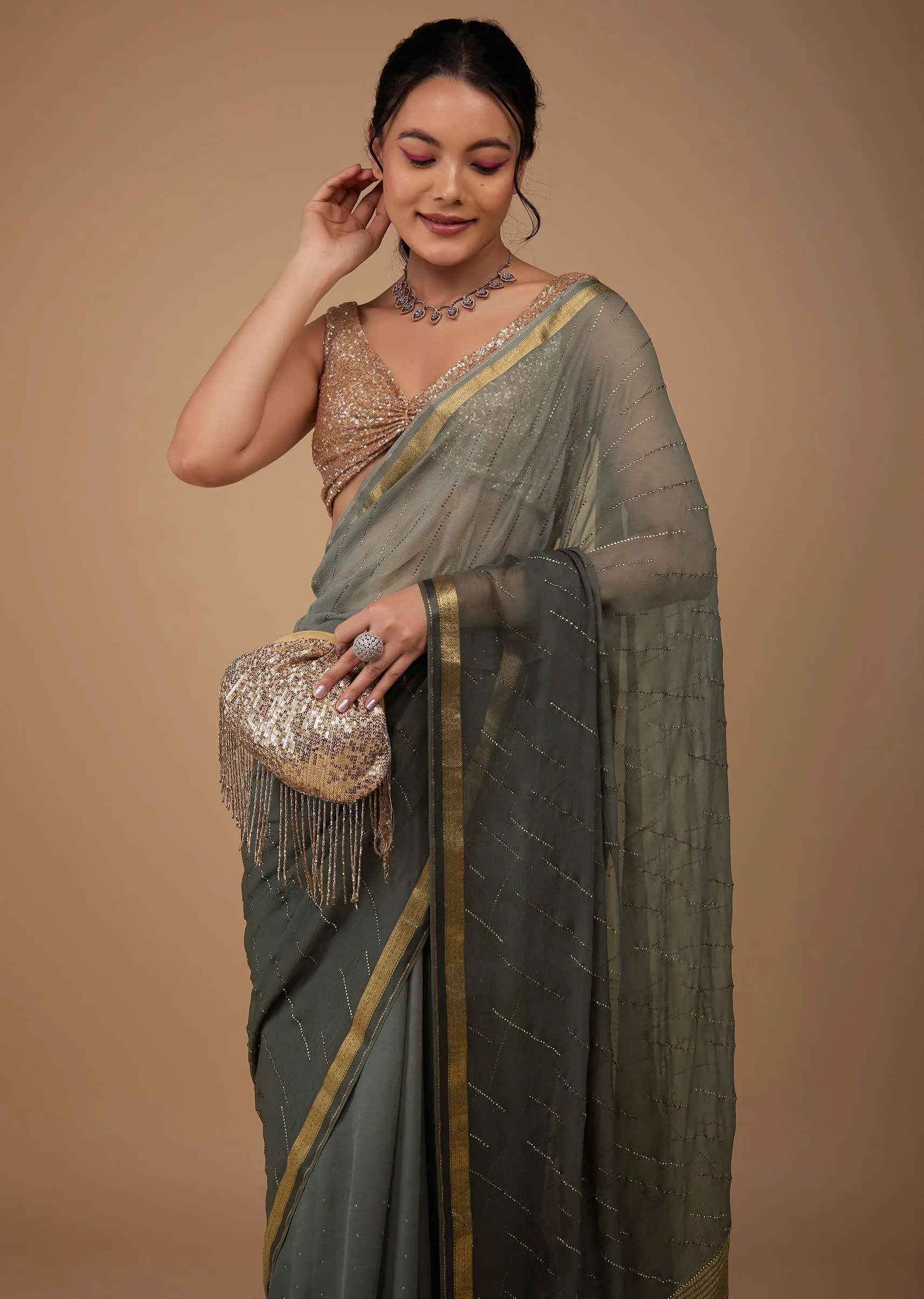 Fog Grey Chiffon Saree With Swarovski Stone Embellishments And Zari Border