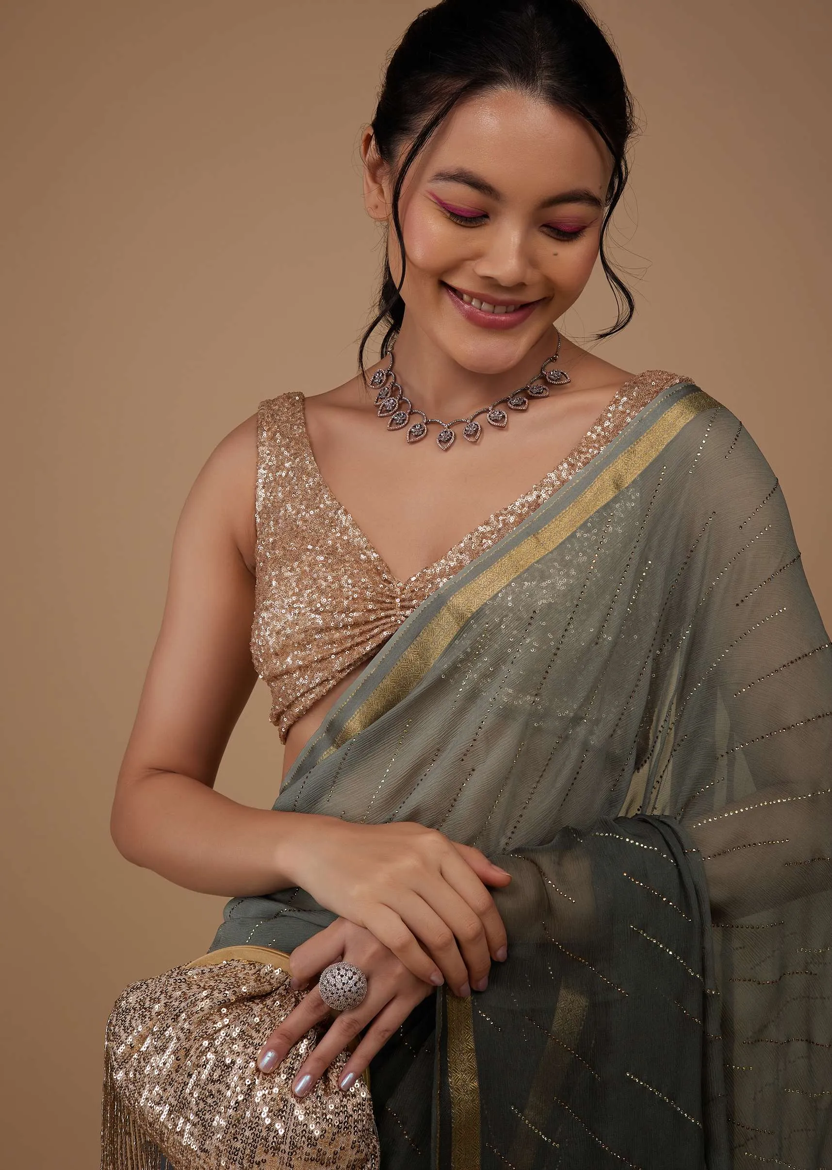 Fog Grey Chiffon Saree With Swarovski Stone Embellishments And Zari Border